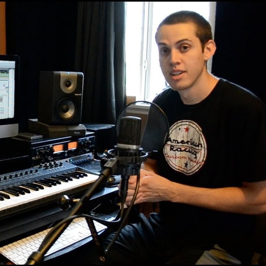 A well-organized home recording studio featuring essential equipment like microphones, headphones, studio monitors, and an audio interface