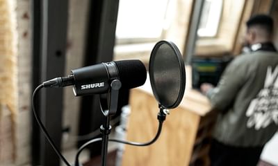 How can I make my voice sound more professional when recording audio?