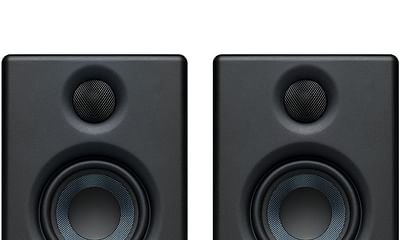 What are the essential equipment for a home recording studio?
